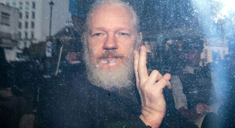 New York Times and Four Other News Outlets Call for Julian Assange's